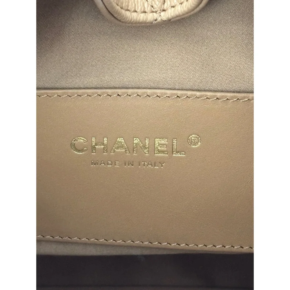 Chanel 25 Quilted Caviar Leather Beige Gold Hardware Drawstring CC, medium siz
